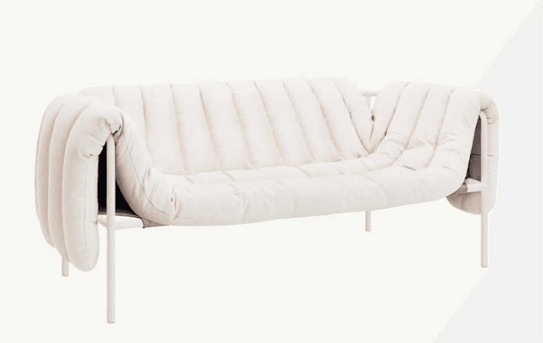 A contemporary two-seater loveseat featuring a minimalist, exposed metal frame and a single, generously padded, channel-tufted upholstered cushion draped over it to form the seat, back, and armrests. The upholstery is a light, off-white fabric. — 3D model