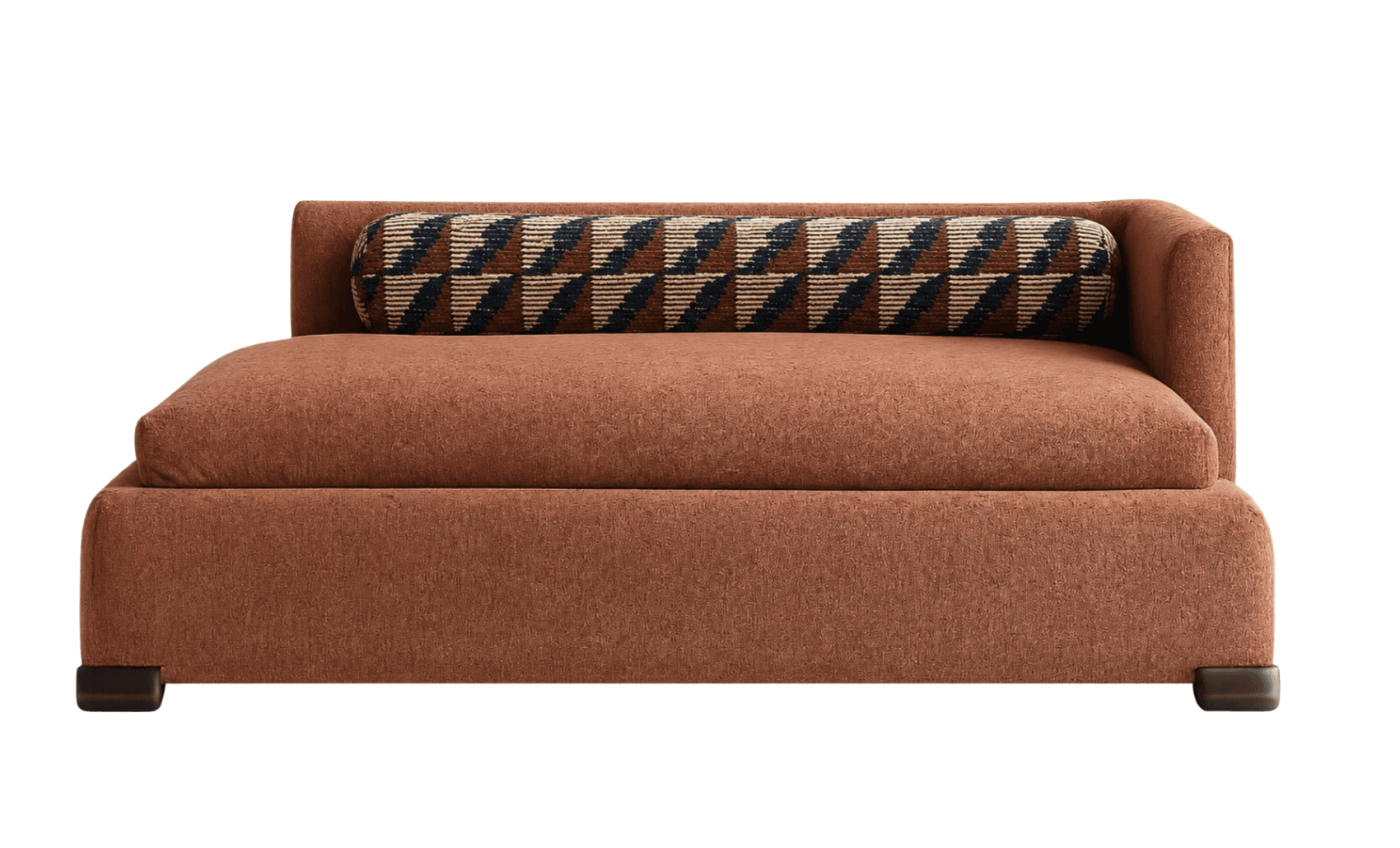 A contemporary modular sofa chaise with a low profile and rounded edges. The main upholstery is a textured, rust-colored fabric. It features a prominent seat cushion and a backrest with an integrated bolster pillow. The bolster pillow has a distinctive geometric pattern in shades of brown, black, and cream. The sofa is supported by four dark, square, block-like feet. — 3D model