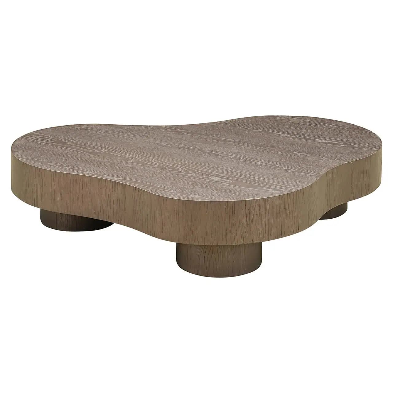 A modern, freeform coffee table with an organic, irregular shape. The table features a thick, curved top and is supported by three short, cylindrical legs integrated into the base structure. The surface exhibits a visible wood grain pattern, suggesting a wooden construction with a matte finish. — 3D model