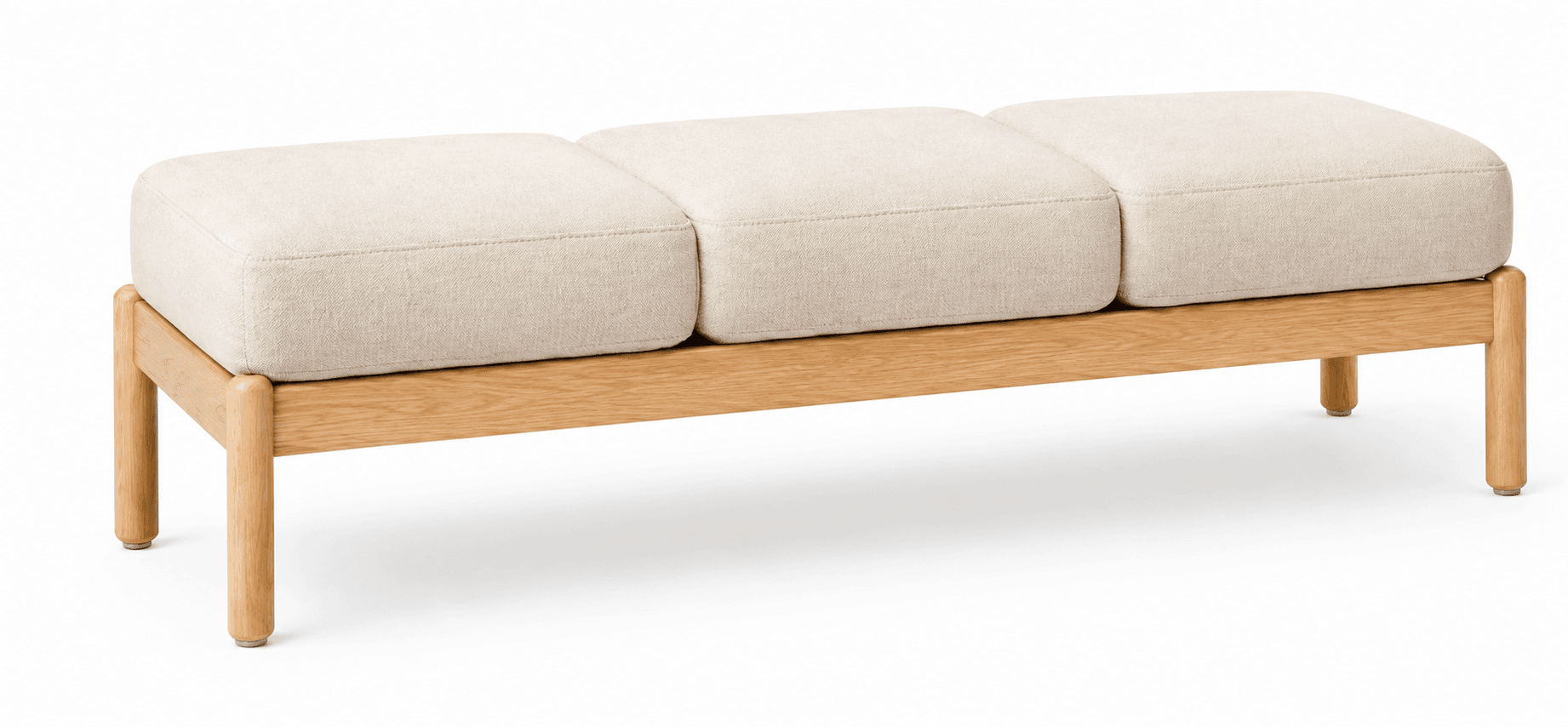 A modern bench with a wooden frame and a three-cushioned upholstered seat. The frame consists of a horizontal rectangular support and four cylindrical legs. The seat is divided into three distinct, square-shaped cushions with a fabric upholstery and visible stitching. The legs have small metallic caps at their base. — 3D model