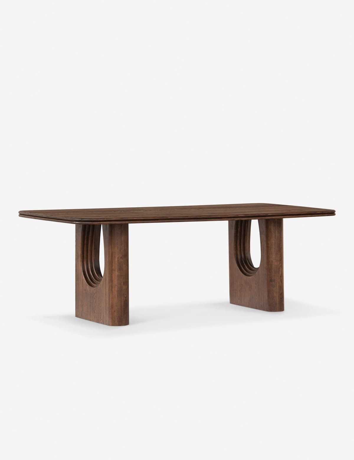 A wooden dining table with a rectangular top and two sculpted, arching pedestal bases. Each base features concentric, semi-circular cutouts, creating an organic, sculptural design. — 3D model
