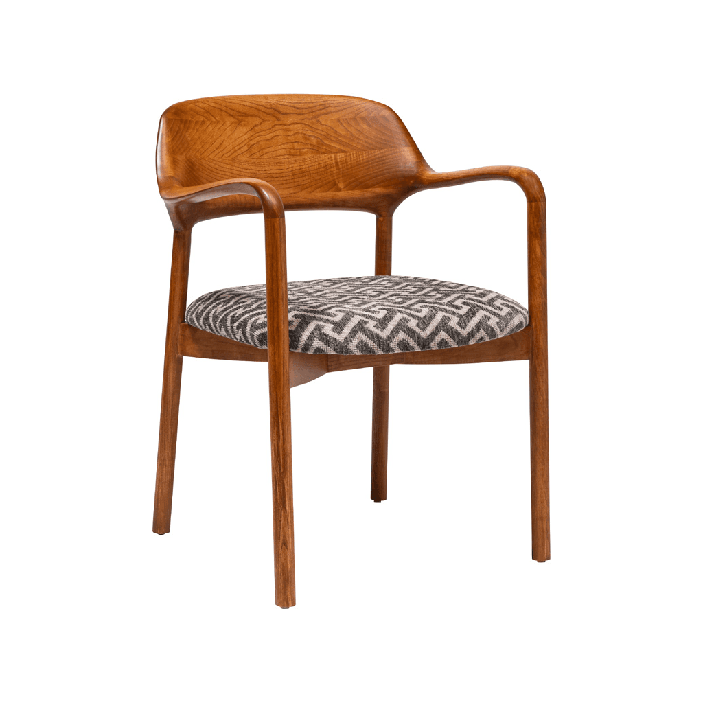 A mid-century modern style dining armchair featuring a warm-toned wooden frame, a gracefully curved solid wood backrest, and integrated armrests. The seat is upholstered in a fabric with a distinctive geometric zigzag pattern in shades of gray and white. The chair stands on four slender, tapered wooden legs. — 3D model
