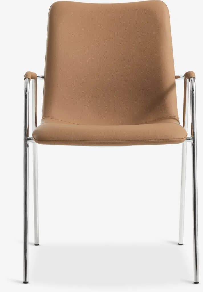 A contemporary armchair featuring a curved backrest and seat upholstered in tan leather or faux leather, supported by a polished chrome tubular metal frame that extends to form the legs and integrated armrests with small upholstered pads. The design is sleek and minimalist. — 3D model