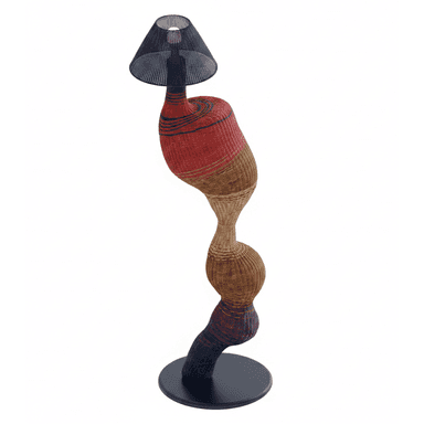 A tall, sculptural floor lamp featuring an organic, serpentine body constructed from multi-colored woven rattan or wicker. The body transitions through shades of red, brown, beige, and dark blue/purple. It is topped with a black conical mesh shade and stands on a flat, circular dark base. — 3D model (AI enhanced source)