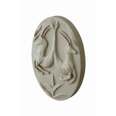 An oval-shaped relief sculpture featuring a symmetrical design of two stylized horned animals, resembling gazelles or antelopes, facing outwards from a central plant or tree motif. The sculpture has a pale, off-white or light gray matte finish, suggesting a material like plaster or a stone composite. The figures are rendered in low relief, providing depth and texture to the decorative piece. — 3D model (AI enhanced source)