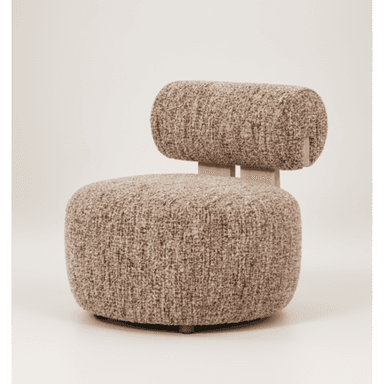 An armless lounge chair upholstered in a textured, light brown bouclé fabric. The design features a plush, rounded seat and a distinct cylindrical backrest supported by minimalist wooden elements, contributing to its modern and organic aesthetic. — 3D model (AI enhanced source)