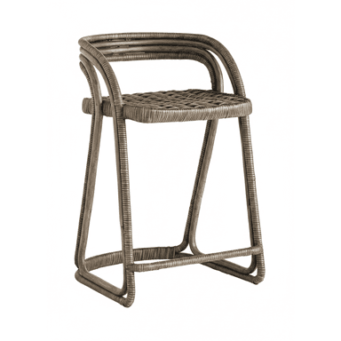 A counter or bar stool constructed from bent and woven rattan, featuring a curved backrest and an integrated footrest. The material exhibits a natural, weathered gray-brown finish, contributing to a rustic or coastal aesthetic. — 3D model (AI enhanced source)