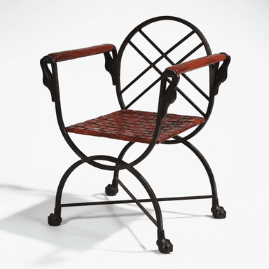 An armchair with a dark wrought iron frame, featuring an X-shaped base and curved supports. The seat is crafted from woven reddish-brown leather strips. The backrest is circular with a latticework design. The armrests have padded leather wraps, and the legs terminate in ornate paw feet. — 3D model (AI enhanced source)