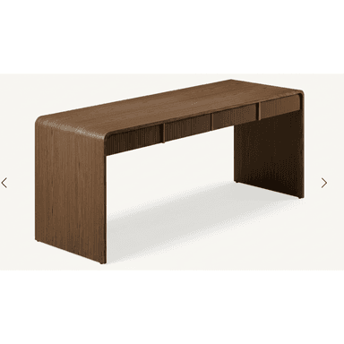 A modern desk constructed from dark wood, featuring a distinctive waterfall edge design where the tabletop seamlessly curves down to form the legs. The desk includes three integrated drawers with fluted fronts, adding a textural element to its minimalist form. — 3D model (AI enhanced source)