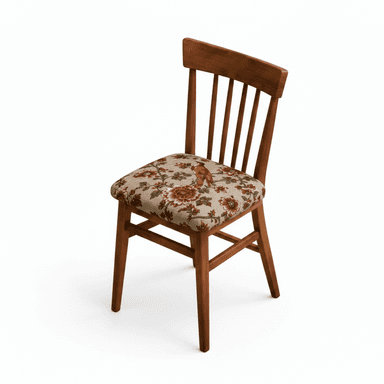 A traditional wooden dining chair featuring a spindle backrest and an upholstered seat cushion. The wood frame has a warm, medium-brown finish, and the seat is covered in a beige fabric with a vibrant floral and bird pattern. — 3D model (AI enhanced source)