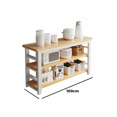 A multi-tiered kitchen storage rack featuring a light wood-toned top surface and three open shelves, supported by a white-painted rectangular frame. It is shown holding various kitchen appliances and containers. — 3D model (AI enhanced source)