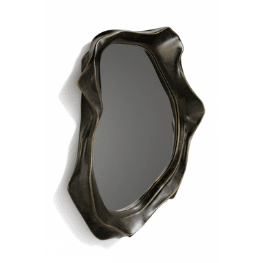 A wall-mounted mirror featuring an irregularly shaped, organic, and sculptural frame. The frame has a dark, aged metallic finish, possibly bronze or antique brass, with textured, undulating surfaces that create a sense of movement and depth. The mirror glass itself is also irregularly shaped, conforming to the inner edge of the fluid frame. It casts a soft shadow on the white background, emphasizing its three-dimensional form. — 3D model (AI enhanced source)