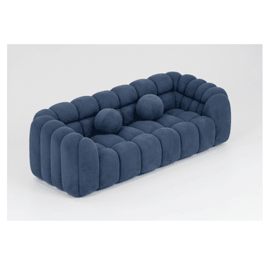 A modern three-seater sofa characterized by its sculptural, rounded, segmented design, upholstered in a deep blue velvet-like fabric and accompanied by two matching spherical toss pillows. — 3D model (AI enhanced source)