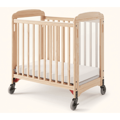 A compact, wooden crib with a white mattress. The crib features vertical slats along its sides and a slightly curved top rail. It is equipped with four wheels for mobility. The overall construction appears sturdy and functional, suitable for infants. — 3D model (AI enhanced source)