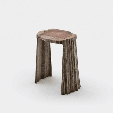 A sculptural accent table featuring an irregular reddish natural stone top, bordered by a thin brass trim. The base is composed of three sturdy legs crafted from what appears to be cast bronze, exhibiting a heavily textured, bark-like finish in a dark, weathered tone. The overall design emphasizes organic forms and robust materials. — 3D model (AI enhanced source)
