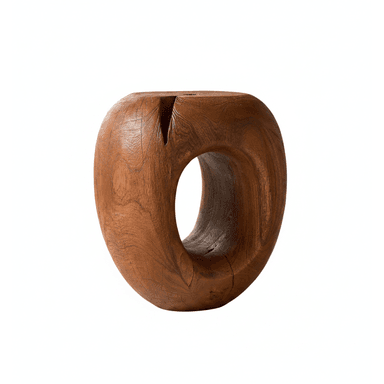A solid wood stool with a toroidal or donut-like shape. It features a large central void and a carved, organic form. The surface shows wood grain and some natural imperfections. — 3D model (AI enhanced source)