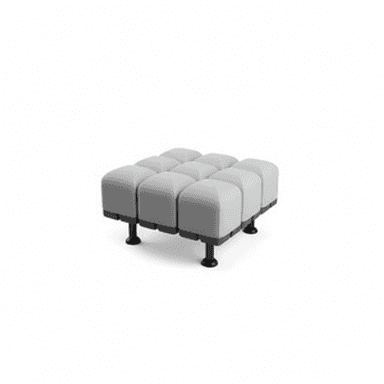 A modern, modular ottoman with a tufted or segmented upholstered top. The ottoman consists of multiple individual seating/cushion units arranged in a rectangular grid, likely 3x3, forming a unified seating surface. It is supported by short, dark-colored legs. The design is minimalist and contemporary. — 3D model (AI enhanced source)