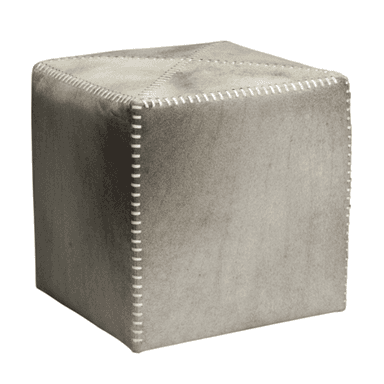 A cube-shaped upholstered ottoman or pouf, covered in a light grey or beige suede-like material. It features prominent white saddle stitching along all its edges and across the top surface, dividing it into four triangular sections. The stitching adds a decorative, handcrafted element. — 3D model (AI enhanced source)