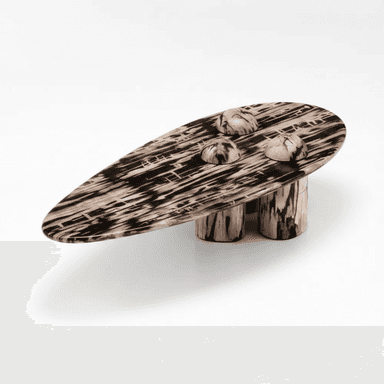 An abstract organic coffee table featuring an elongated, irregular oval tabletop. The table is crafted from a material resembling petrified wood, showcasing a distinct swirling pattern of dark brown/black and lighter brown/beige tones, creating a visually striking, organic motif. Three integrated, semi-spherical elements with a matching pattern are set into the surface of the tabletop. The table is supported by three short, cylindrical legs, also exhibiting the same patterned finish, providing a stable base and cohesive aesthetic. — 3D model (AI enhanced source)