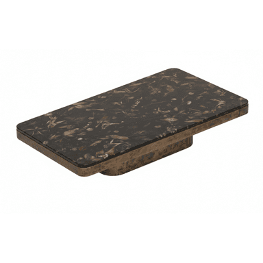 A rectangular coffee table featuring a dark, botanical inlay tabletop and an antique brass-finished integrated base. The tabletop displays various dried or preserved plants, leaves, and flowers embedded within a clear or dark resin, giving it a unique, naturalistic pattern. The edges of the tabletop are softly rounded. The base is low-profile and appears to be a single, solid mass finished in an aged or antique brass, providing a sturdy and elegant foundation for the table. — 3D model (AI enhanced source)