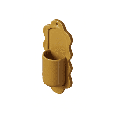A small, wall-mounted shelf with a decorative scalloped edge. It features a cylindrical holder protruding from the front, designed for storage or display. — 3D model (AI enhanced source)