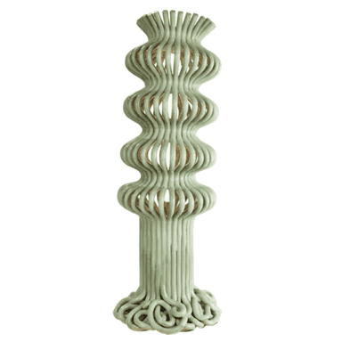 A tall, slender floor lamp crafted from rattan, featuring an undulating, wavy profile painted in a soft sage green. The lamp has an integrated light source visible through the open rattan structure, which is coiled at its base. — 3D model (AI enhanced source)