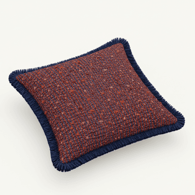 A square throw pillow featuring a textured tweed fabric in a mix of terracotta red and navy blue hues, finished with a navy blue fringe trim along all four edges. — 3D model (AI enhanced source)