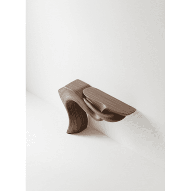 A unique sculptural wall-mounted console table crafted from dark brown walnut wood. Its design features fluid, organic curves that seem to unfurl from the wall, creating a dynamic and artistic silhouette. The table provides a flat surface for display, supported by its integrated, flowing base structure. — 3D model (AI enhanced source)
