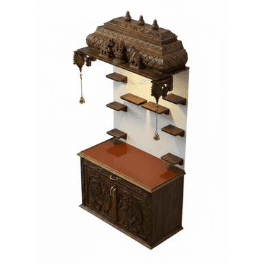 A dark wooden display cabinet with ornate carvings on the doors and sides. It features a textured orange-brown top surface. Mounted above the cabinet is a decorative wooden structure resembling a temple or shrine, featuring intricate carvings of figures and decorative elements, with several small shelves extending from a central white panel. Two small brass bells hang from chains, attached to the upper decorative structure. — 3D model (AI enhanced source)