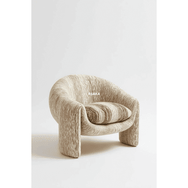 A low-profile armchair with an organic, rounded form, upholstered in a textured fabric resembling wood grain. It features a continuous, curvilinear shape with no distinct legs, and includes a striped accent pillow. — 3D model (AI enhanced source)