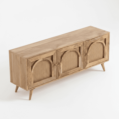A long, low wooden cabinet featuring three doors. Each door incorporates a woven rattan panel, overlaid with a decorative arched wooden frame. The cabinet stands on four tapered, splayed legs, indicative of a modern or mid-century design influence. The wood has a natural, light finish, showcasing its grain. — 3D model (AI enhanced source)
