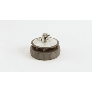 A sophisticated tiered round coffee table featuring a white marble top, a middle wooden tier, and a distinctive ribbed upholstered base in a muted olive-green tone. The multi-level design offers functional surface area and a sculptural aesthetic. — 3D model (AI enhanced source)