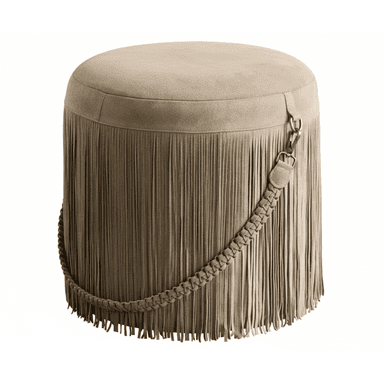 A round, upholstered ottoman featuring a full skirt of long fringe. The top surface is smooth and upholstered in a suede-like material. A decorative braided strap, also in the same material, is draped around the side, secured by a metal clasp with an antique brass finish. The fringe extends to the floor, creating a cohesive and textured look. — 3D model (AI enhanced source)