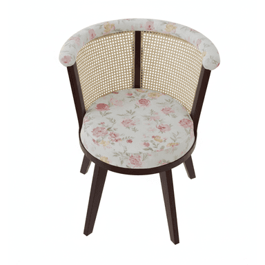 A stylish accent chair featuring a dark stained wooden frame, a rounded cane backrest, and a comfortably upholstered seat and top rail. The upholstery showcases a delicate floral pattern with pink, green, and orange hues on a light background. The chair is supported by four sturdy, tapered legs. — 3D model (AI enhanced source)
