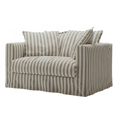 A casual two-seater loveseat featuring a full slipcover upholstered in a vertical stripe pattern of beige/light brown and off-white. The piece includes two loose seat cushions and several loose back cushions, all matching the striped fabric. It has wide, squared arms and a skirted base that extends to the floor, contributing to its relaxed and informal appearance. The overall design emphasizes comfort and a laid-back aesthetic. — 3D model (AI enhanced source)