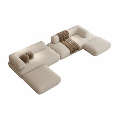 A modular sectional sofa with a low profile and rounded edges. It features a light beige, textured upholstery. The configuration includes multiple seating elements, armrests, and detached ottomans, arranged in a U-shape with an extended chaise section. Two small, round decorative pillows in a brown textured fabric are placed on one section, and a brown woven throw blanket is draped over another. The sofa appears to be designed with a modern, minimalist aesthetic. — 3D model (AI enhanced source)