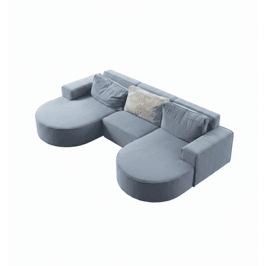 A modular sectional sofa with a light blue upholstered finish. The sofa features a curved chaise lounge section on the left and a straight section with an armrest on the right. It includes several back cushions and one decorative throw pillow with a textured pattern. The overall design is contemporary and low-profile. — 3D model (AI enhanced source)