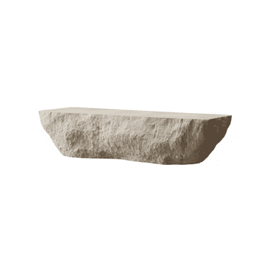 A monolithic bench carved from a single piece of light-colored natural stone, possibly limestone. Its top surface is relatively flat, providing a seating area, while the sides exhibit a rough, chiseled, and organic texture with an irregular, tapered base. The overall form is rectangular, emphasizing its raw, primitive aesthetic. — 3D model (AI enhanced source)