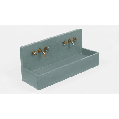 A wall-mounted, rectangular trough sink made of blue-gray concrete, featuring an integrated backsplash. Two sets of wall-mounted brass faucets with cross handles are installed above the basin. The design is minimalist and industrial. — 3D model (AI enhanced source)