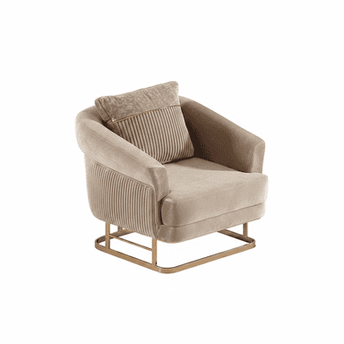 A contemporary armchair featuring soft, light brown velvet upholstery with a distinctive fluted or reeded pattern on its backrest and the outer sides of its curved armrests. The chair is supported by a sleek, rectangular gold-finished metal base. It includes a loose back cushion, also upholstered in velvet, with a contrasting patterned fabric panel and a gold trim detail. — 3D model (AI enhanced source)