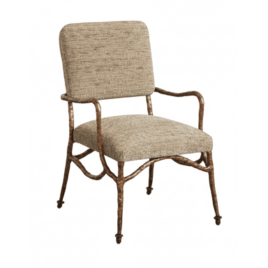 An armchair featuring a distinctive artisan-forged metal frame with an organic, branch-like texture and an antique bronze or copper finish. The seat and backrest are upholstered in a textured, neutral-toned fabric, providing a contrast to the rugged metal frame. The chair has integrated armrests formed by the continuous metal structure, and its legs terminate in small, decorative feet. — 3D model (AI enhanced source)