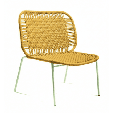 A contemporary low-profile accent chair featuring a seat and backrest constructed from a tightly woven synthetic cord in a mustard yellow hue. The chair sits on four slender, round tubular metal legs finished in a light mint green color. The overall design emphasizes a casual, modern aesthetic with rounded edges on the seat and back frame. — 3D model (AI enhanced source)