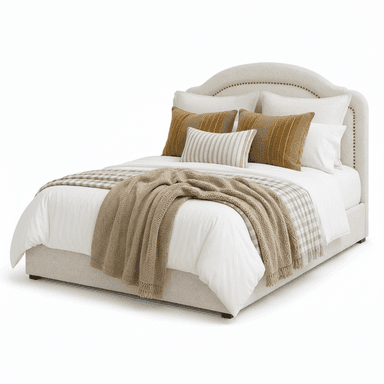An upholstered platform bed featuring an arched headboard with decorative nailhead trim along the edges. The entire frame is covered in a light beige, textured fabric, supported by dark, short legs. The bed is dressed with white bedding and layered with neutral and mustard-colored decorative pillows and throws. — 3D model (AI enhanced source)
