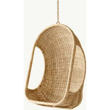 A natural wicker hanging egg chair featuring a classic rounded, cocoon-like shape suspended by a metal chain. The chair is entirely woven from natural wicker or rattan fibers, forming a sturdy yet visually lightweight shell for seating. Its organic texture and form are suitable for various interior and exterior relaxation spaces. — 3D model (AI enhanced source)