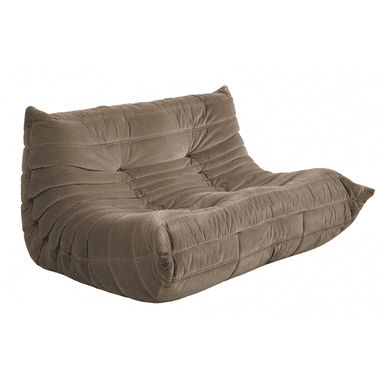 A low-profile, two-seater sofa with a distinctive all-foam construction and an ergonomic design, upholstered in a plush, taupe-colored velvet fabric with a gathered, pleated, and tufted appearance. — 3D model (AI enhanced source)