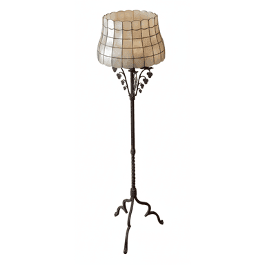 A floor lamp with a decorative, scalloped lampshade composed of square mother-of-pearl or similar material panels framed by dark metal grid. The lampshade is supported by an ornate, dark metal stem that features leaf-like decorative elements. The stem tapers down to a twisted section above a tripod base with elegantly curved legs. — 3D model (AI enhanced source)