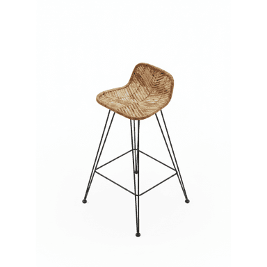 A bar stool featuring a sculpted, woven rattan seat with an integrated low backrest, supported by slender black metal hairpin legs with integrated footrests. The natural tones of the rattan contrast with the dark metal. — 3D model (AI enhanced source)