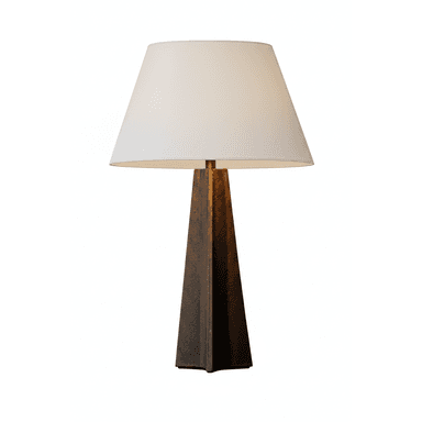 A table lamp featuring a robust, dark-textured tapered base and a classic white drum shade, presented against a plain white background. — 3D model (AI enhanced source)