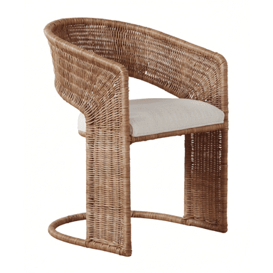 A contemporary accent chair featuring a full woven rattan construction in a natural light brown hue. The chair has a curved backrest that seamlessly transitions into integrated armrests. The frame forms a continuous loop creating a distinct sled base. A light-colored, upholstered fabric cushion provides seating. The design blends natural materials with a modern, sculptural form. — 3D model (AI enhanced source)