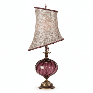 An ornate table lamp featuring a twisted, swirled purple glass body, an antiqued brass base and neck, and a unique angled fabric lampshade. The shade has a textured, possibly animal-print or distressed pattern, trimmed with a decorative border and topped with a small finial adorned with beads. The overall aesthetic is elaborate and decorative. — 3D model (AI enhanced source)